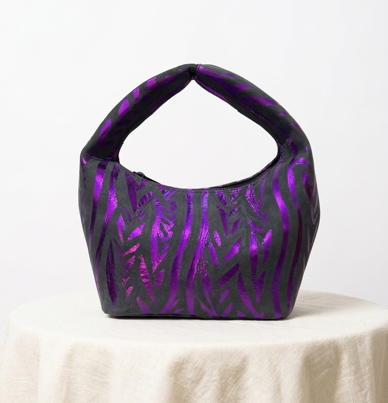 Nelo MIDI, Embossed in purple and black ( first image )