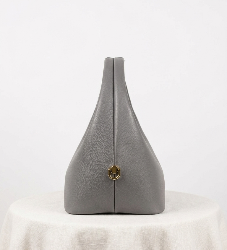 ora lagos Nelo MIDI , in grey ( second image ,side view )